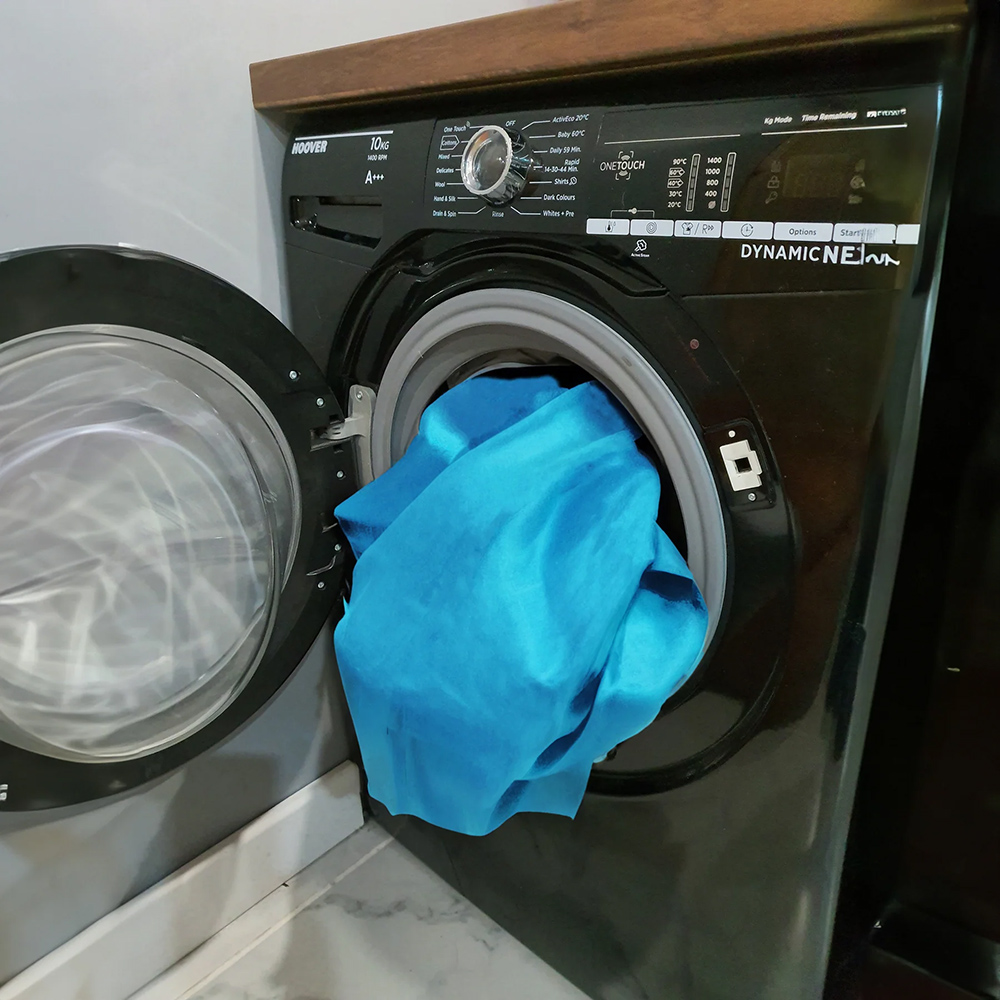 Vetfleece Laundry Wash Bag being used in a washing machine