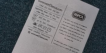 Vetfleece product label showing care instructions and branding information.