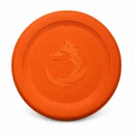 The orange XL DuraToy Flying Disc photographed face on, showing the embossed emblem and the concentric ridges around it