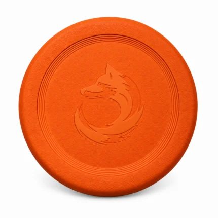 The orange XL DuraToy Flying Disc photographed face on, showing the embossed emblem and the concentric ridges around it