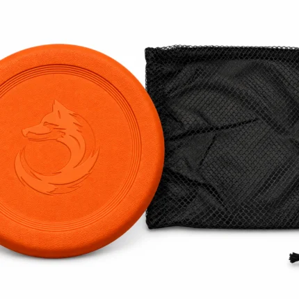 The orange XL DuraToy Flying Disc standing beside the black mesh drawstring bag it is supplied with